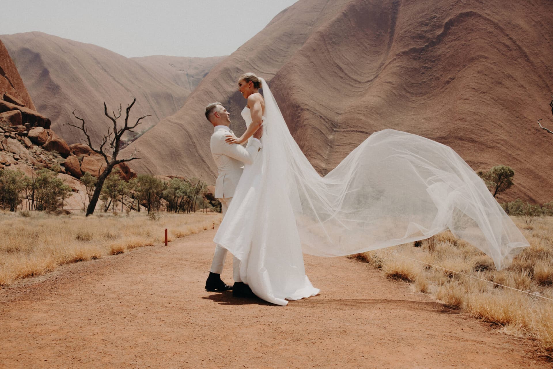 Australia’s Abbey Holmes and Keegan Brooksby Get Married At Uluru, Northern Territory