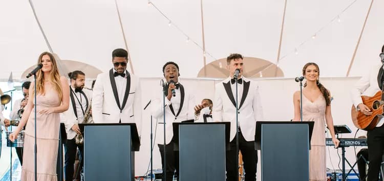 Should You Hire a DJ or a Live Band for Your Wedding Reception?