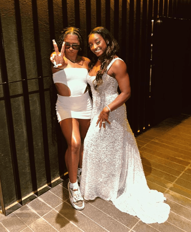 Simone Biles ended her nuptial celebration in this floor-length Galia Lahav gown.