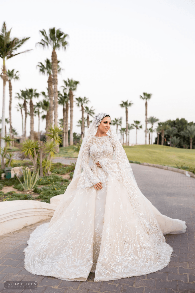 The beautiful bride in her handmade bridal gown with imported fabric from India.