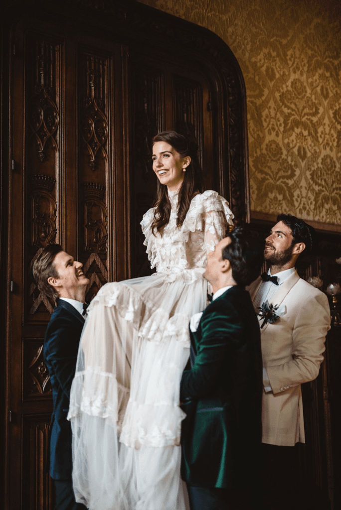 Traditional dance during a Jewish wedding where the bride and groom are lifted up on a chair. 