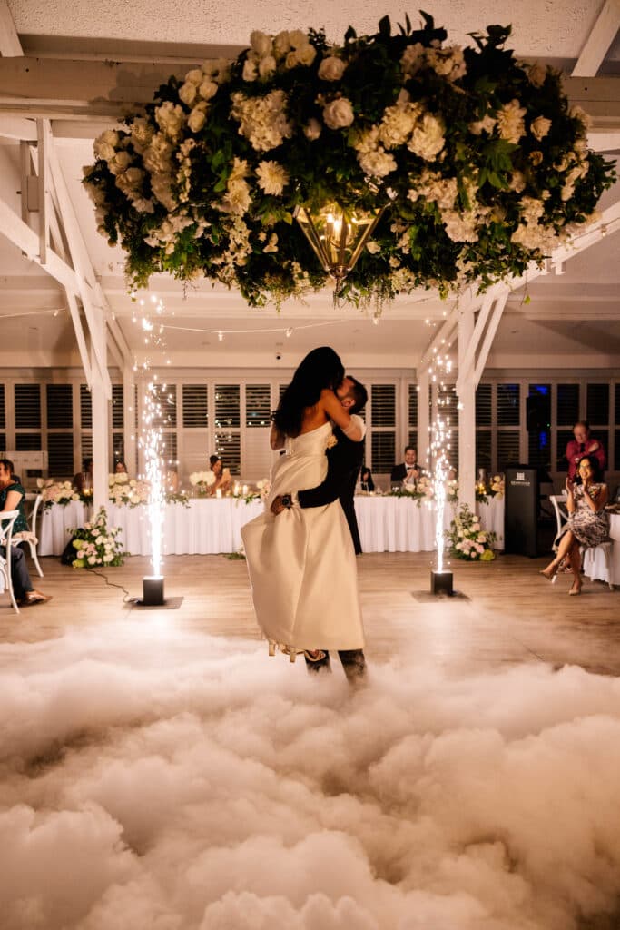 Couple in an embrace at their wedding