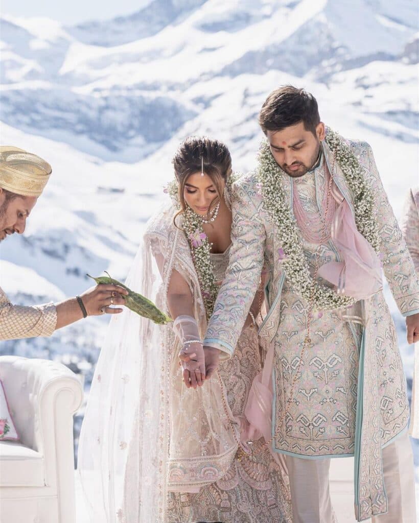Beautiful Indian bride and groom in the Swiss mountains