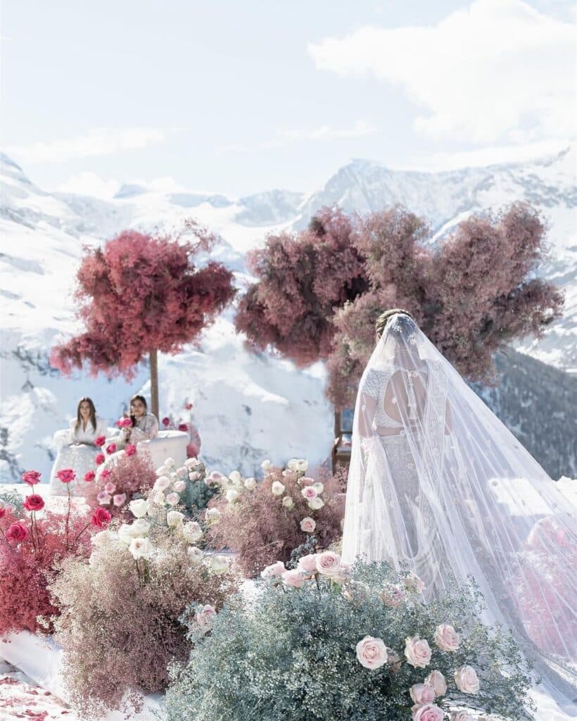 Gorgeous Indian bride walks down the aisle in Switzerland. 