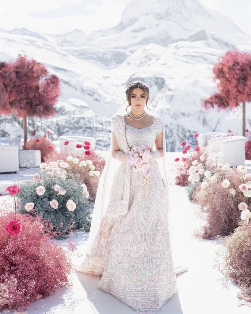 Traditional Indian Bride amidst her snow-capped wedding