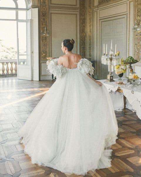 A bride running through an Italian villa.
