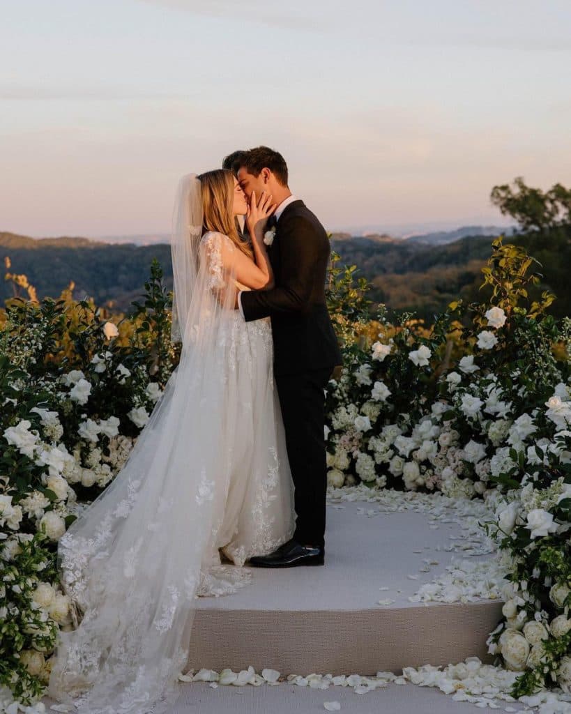 Couple getting married with beautiful backdrop