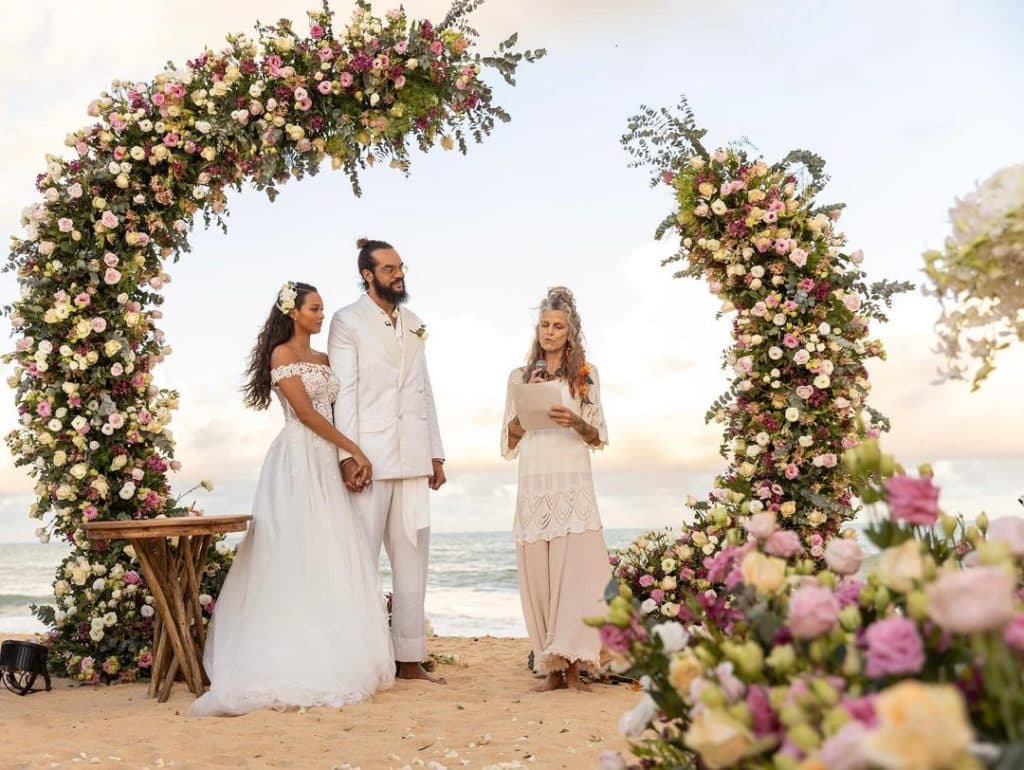 Stunning couple seaside wedding with beautiful florals