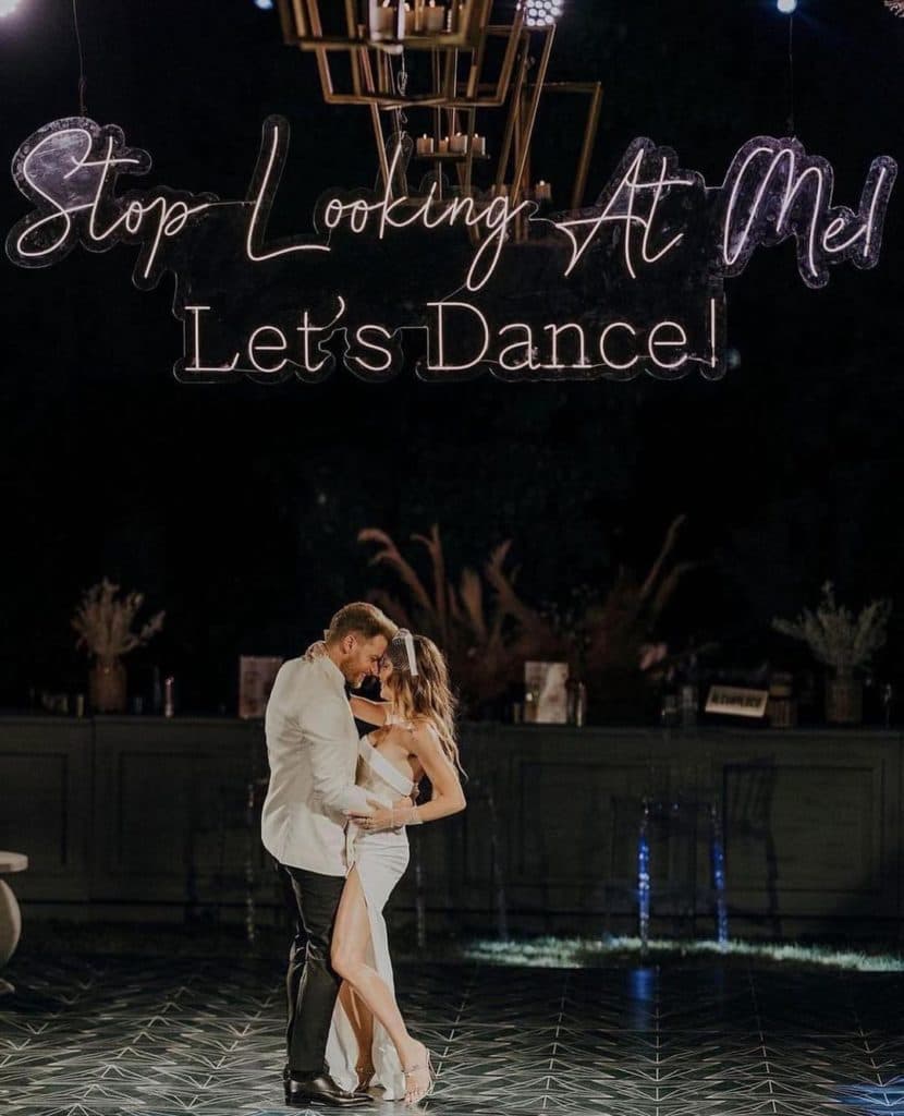 Fun and unique neon sign inviting people to dance