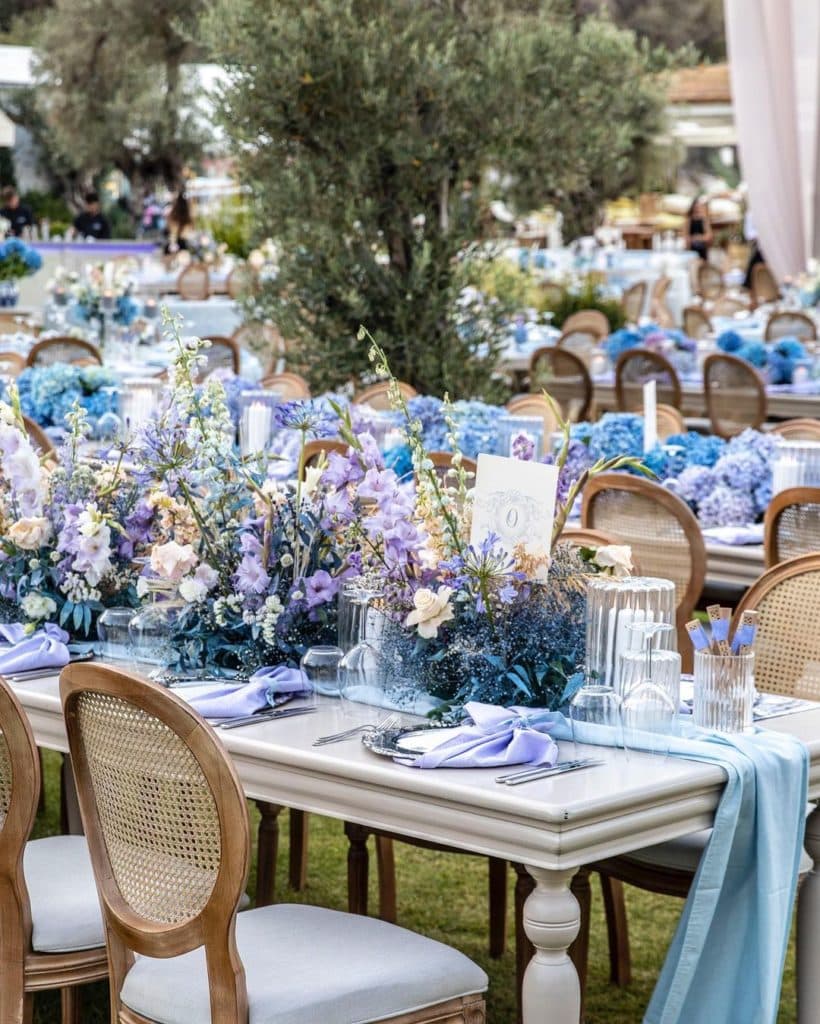 Beautiful table set up featuring lavender and blue flowers