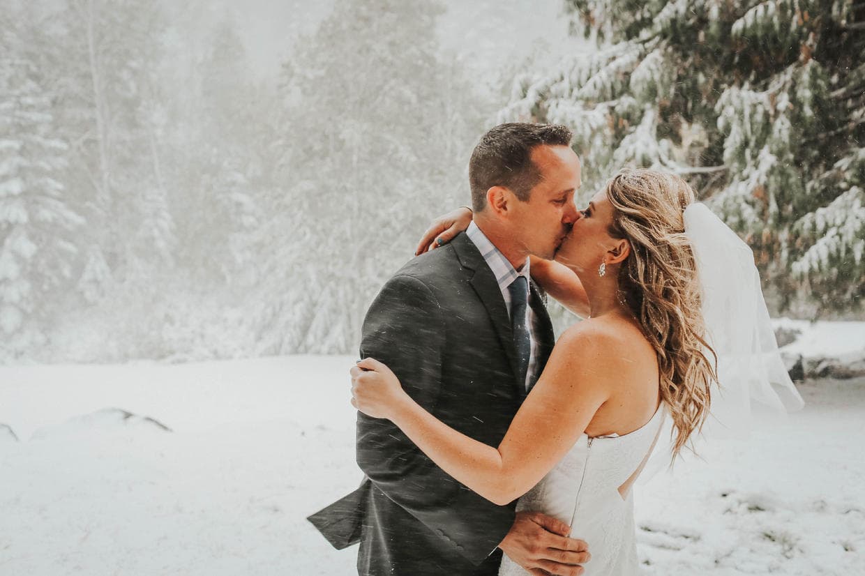 Surprise Snowstorm Makes Incredible Wedding Photo Backdrop