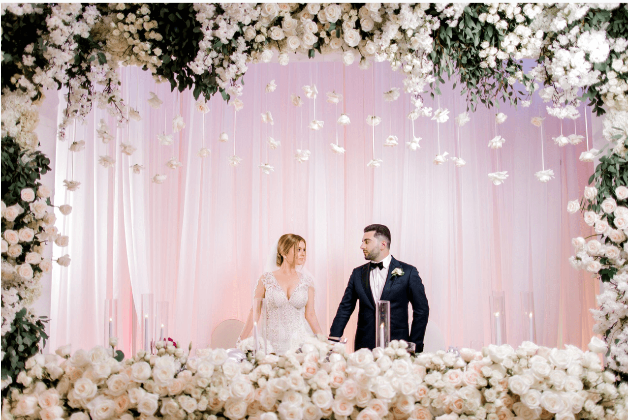 A Classic White Wedding With Lush Greenery