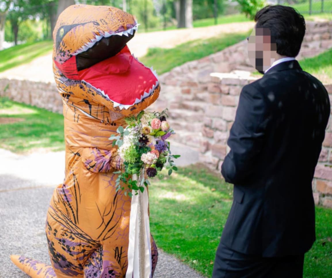 This Prankster Bride Said “I Do” In An Inflatable Dinosaur Costume