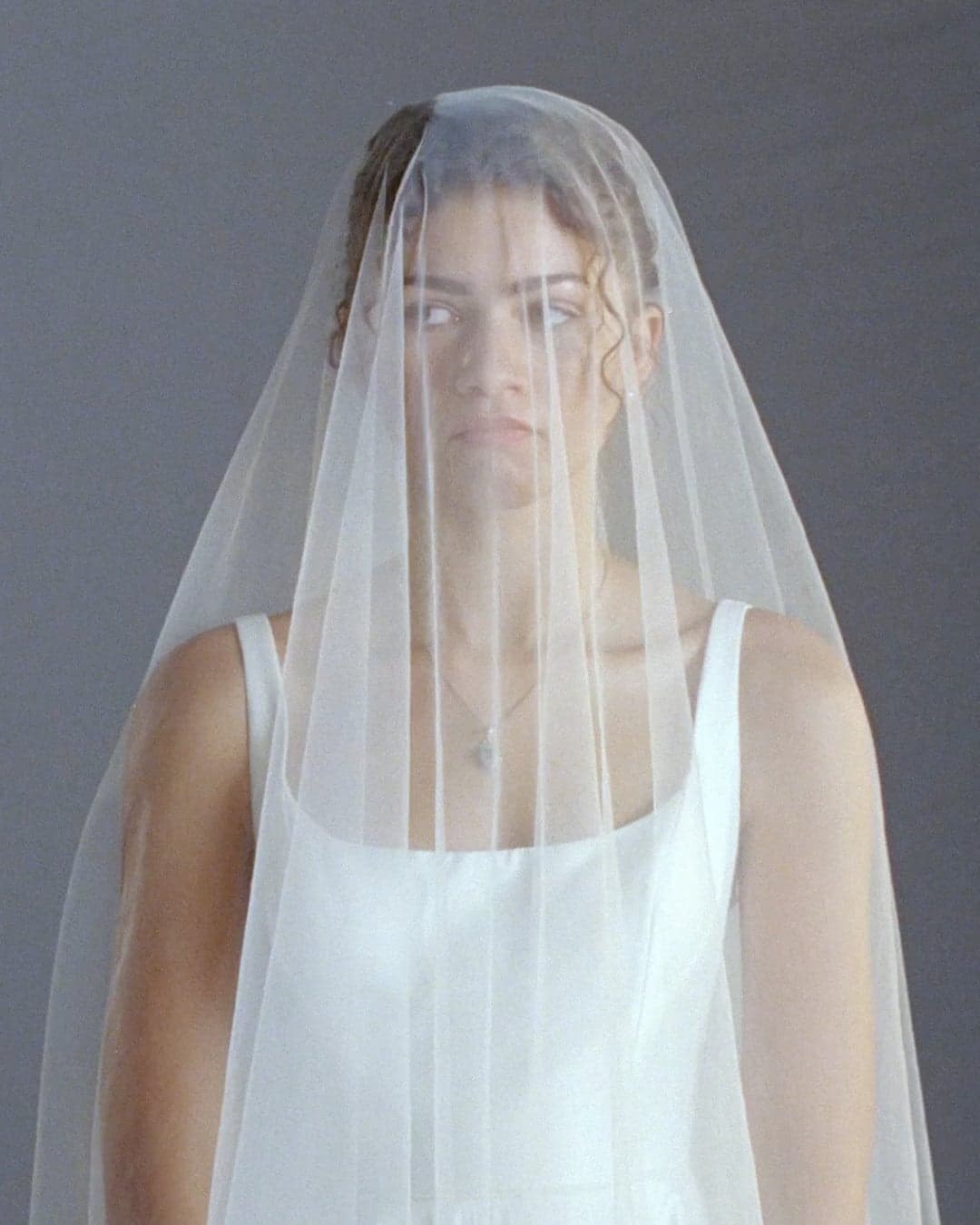 Zendaya Stuns in a Backless Wedding Dress in ‘The Drama’ And Fans Think It Predicts Her Real Bridal Style