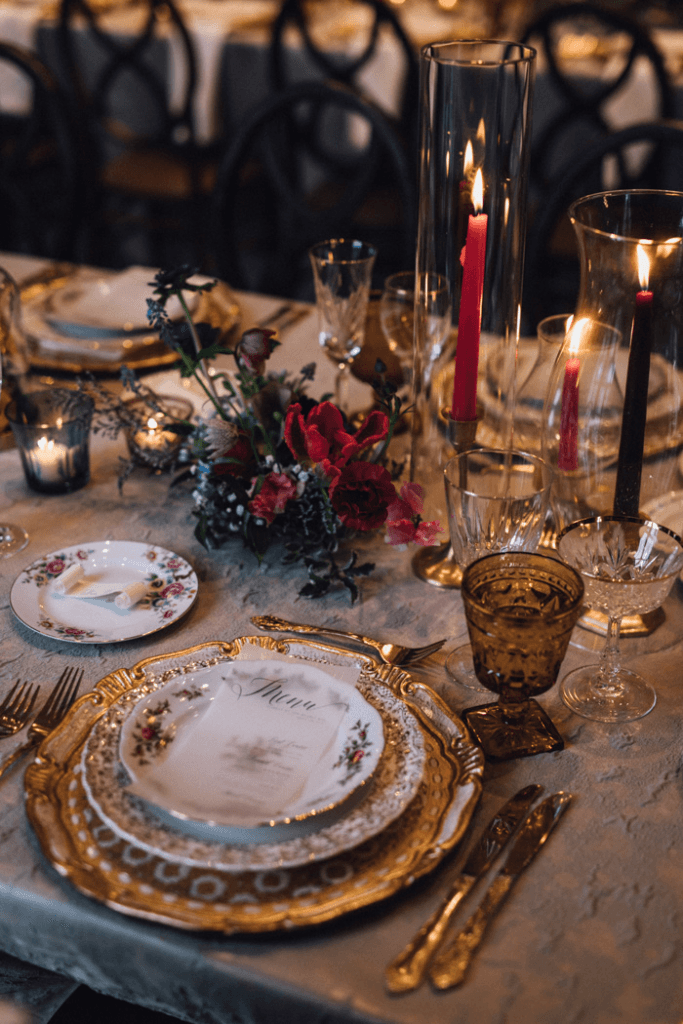 Vintage destination wedding theme with vintage-inspired table decors like candelabras