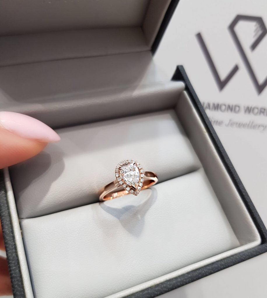 Diamond World Fine Jewellery rose gold pear shaped diamond halo setting