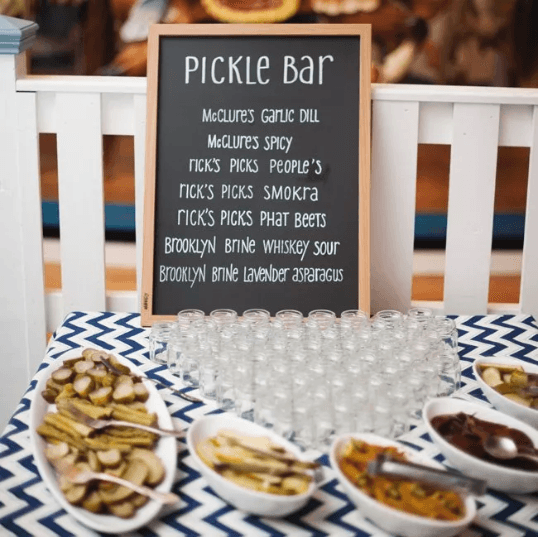 pickle bar on blue and white tablecloth