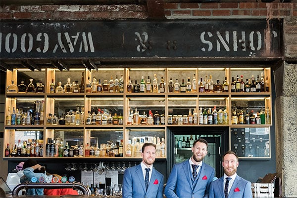 groomsmen in peter jackson suits