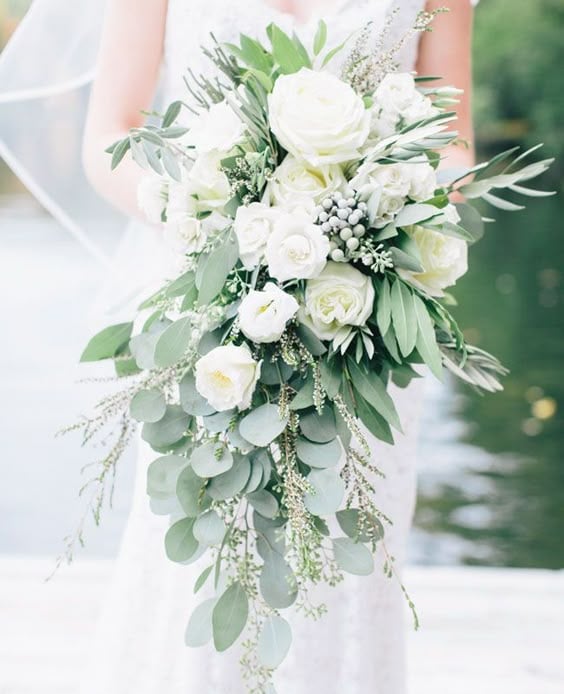 This monochromatic cascading wedding bouquet is subtle, but beautiful.: 