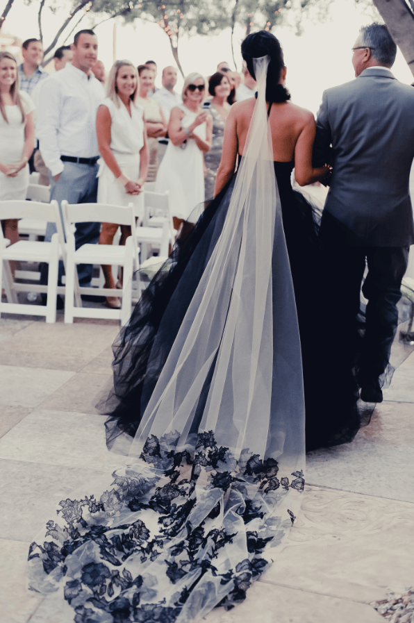 non-traditional wedding dresses, non-traditional wedding dress, black wedding dress, floral wedding dress, Batman wedding, dip-dyed wedding dress, pantsuit wedding , jumpsuit wedding, wedding dress csneakers, pink wedding dress, blue wedding dress, vintage wedding dress