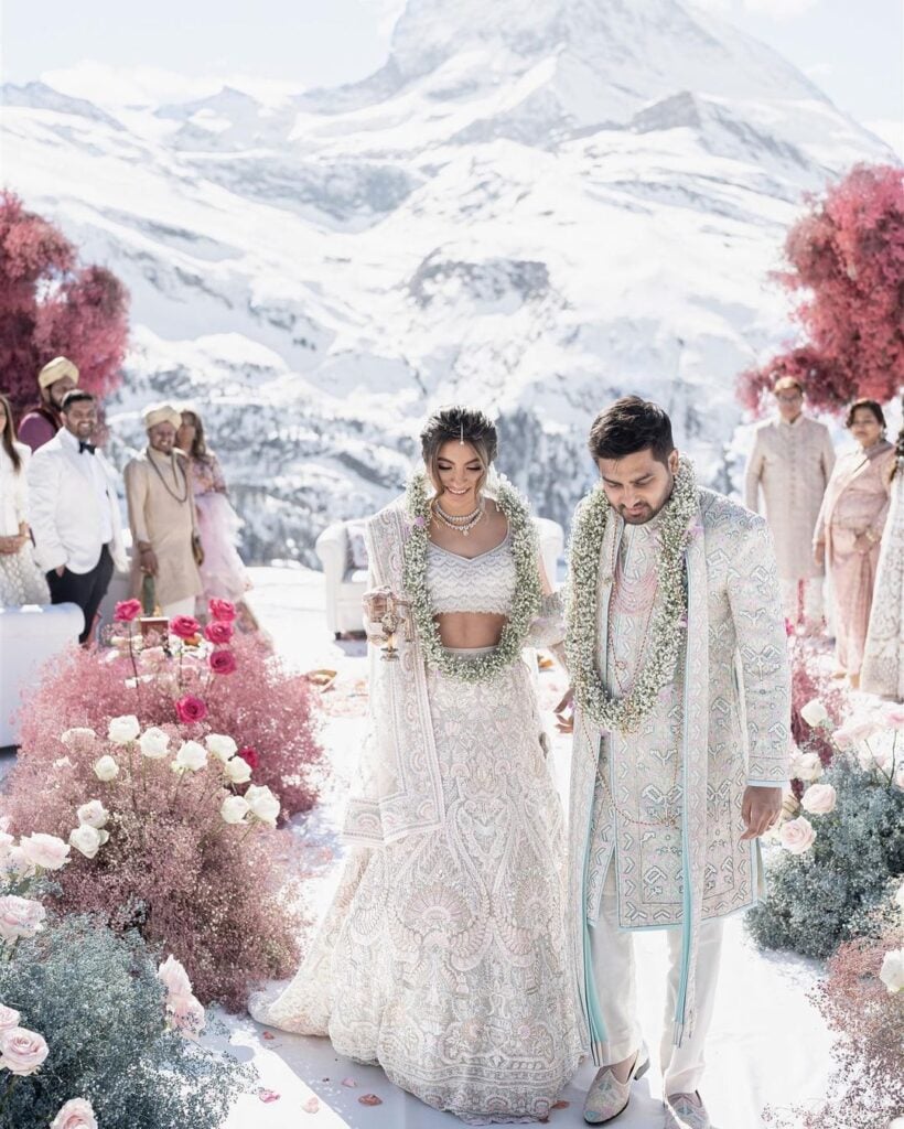 Beautiful Indian Bride and Groom walk down the aisle in the Swiss Mountains