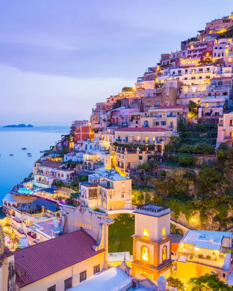 Positano stacked above the sea on the Amalfi Coast at dusk