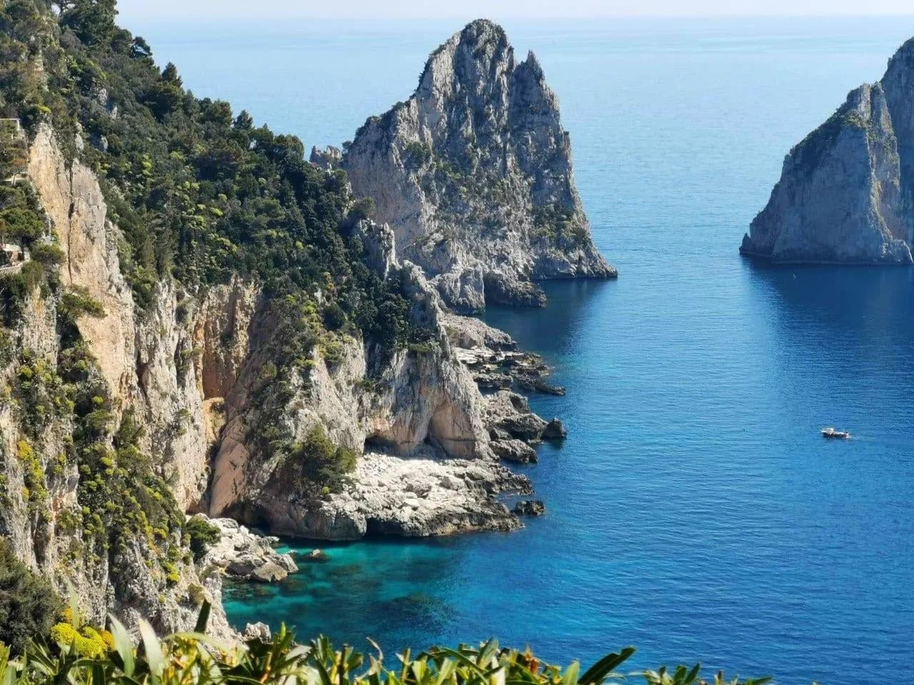 The Faraglioni sea stacks and limestone cliffs off the coast of Capri