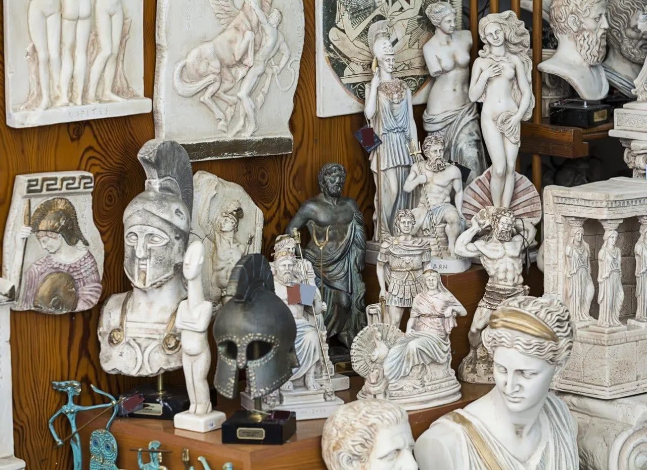 Plaster busts, statues and helmets in an Athens souvenir shop