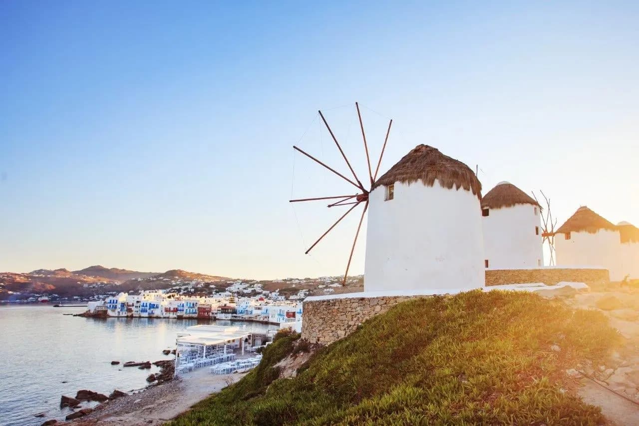 The thatched windmills of Mykonos on a hill above the town