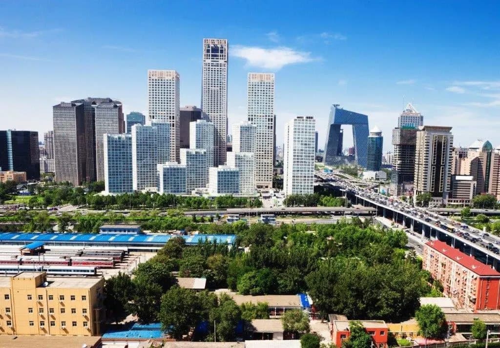 Modern towers of the Beijing business district rising above the city