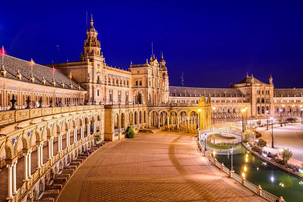 Plaza de España in Seville lit up in the early evening