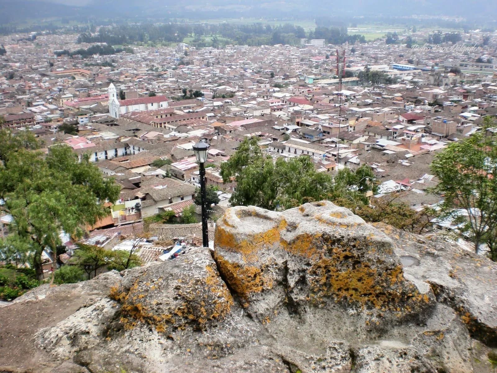 The rooftops of Cajamarca seen from the rocks on Santa Apolonia hill