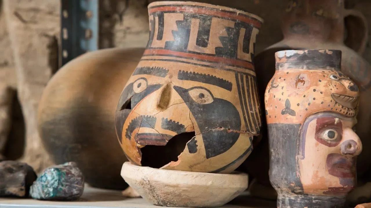 Painted pre-Hispanic ceramic vessels shaped as faces