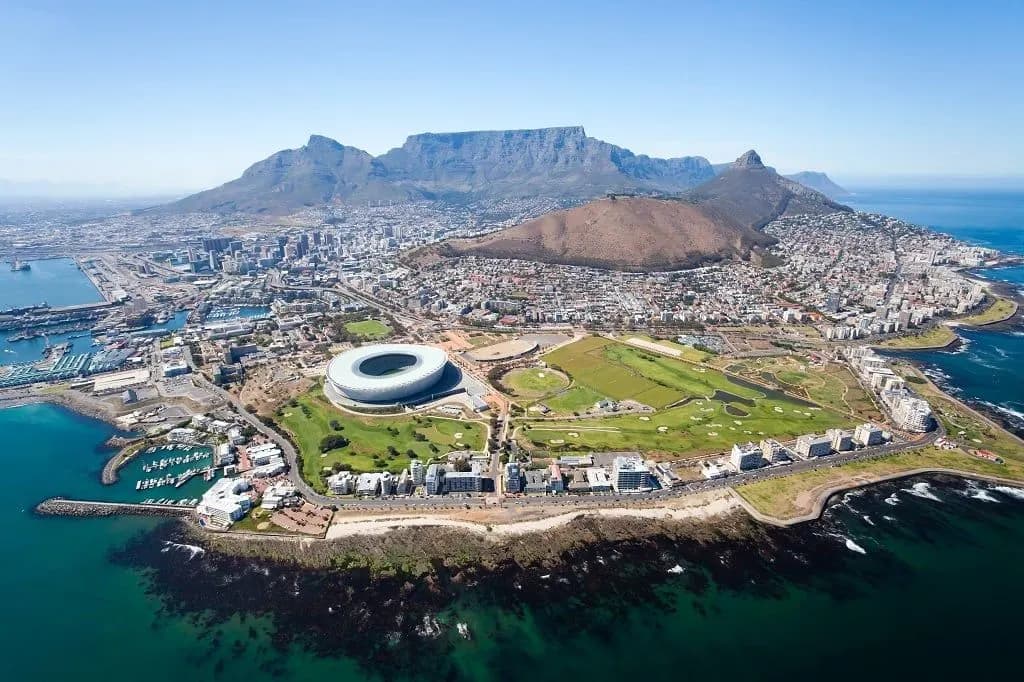 Cape Town and Table Mountain from the air, with the stadium and the sea in front