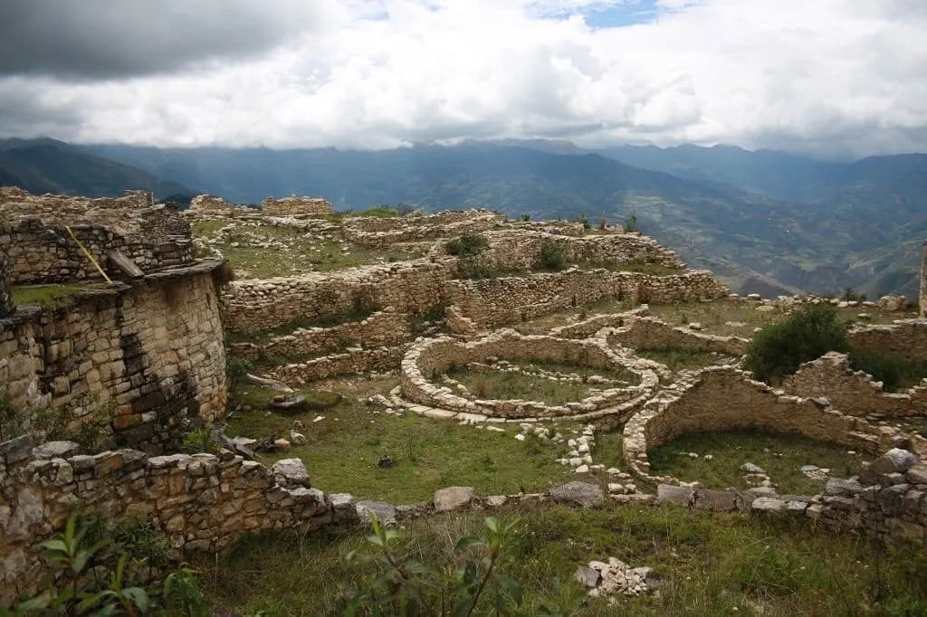 Circular stone foundations of Kuélap on a ridge above the Andes