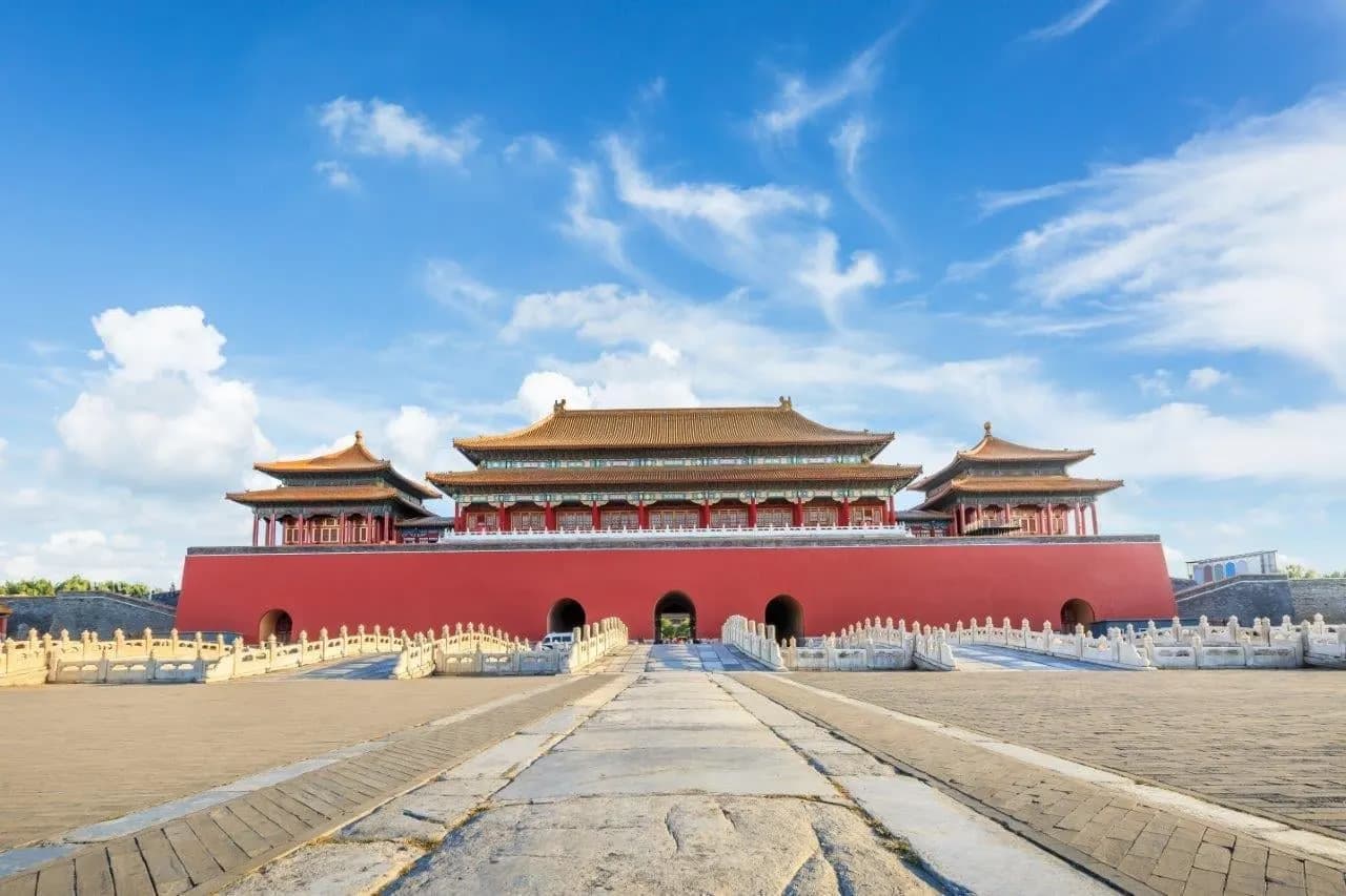 The red walls and golden roofs of the Meridian Gate at the Forbidden City