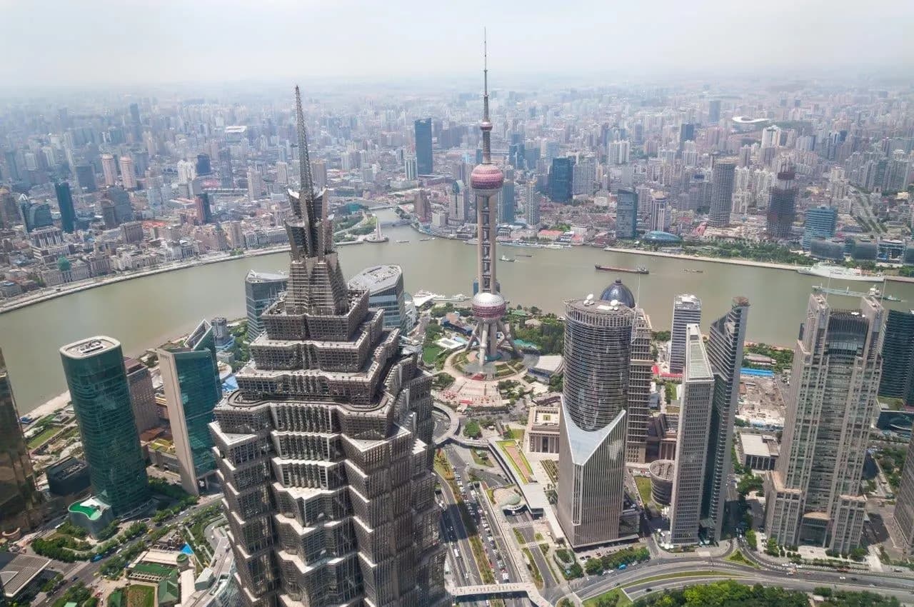 Shanghai's Pudong towers and the Huangpu River seen from above