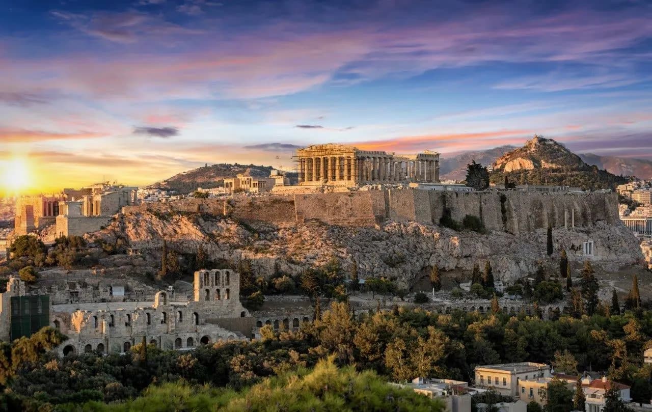 The Acropolis and the Parthenon above Athens at sunset