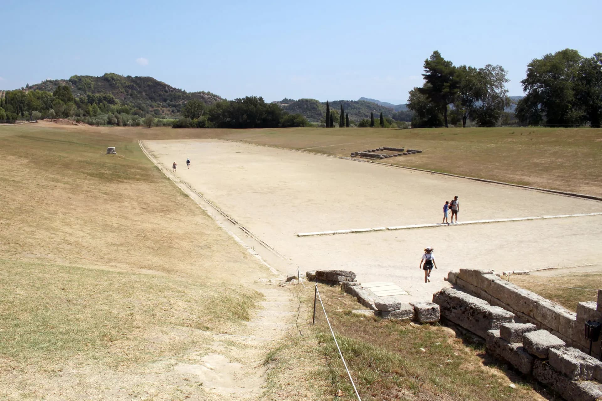 The long earthen track of the ancient stadium at Olympia