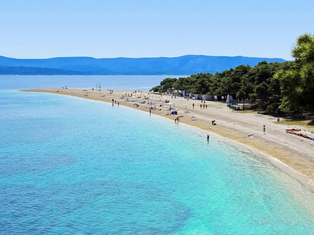 The long pebble spit of Zlatni Rat beach on Brac in clear turquoise water