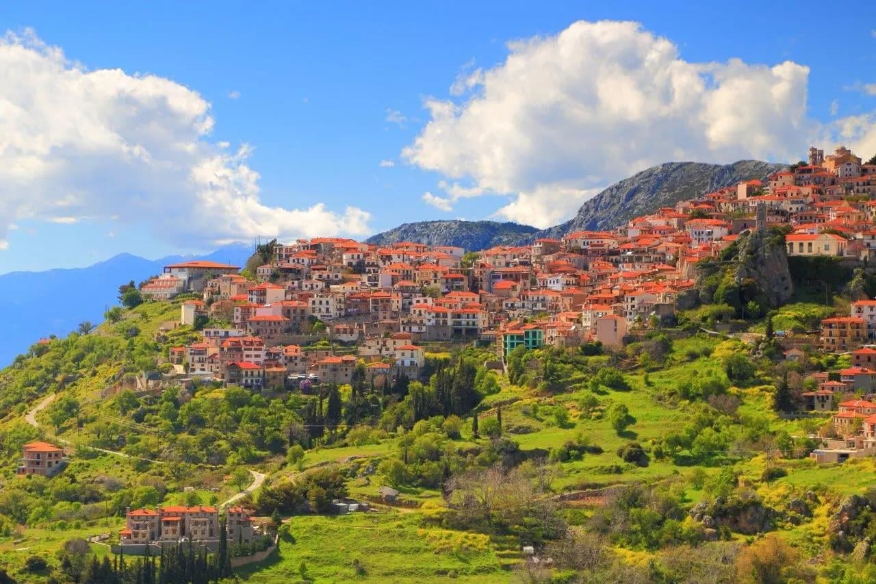 The hillside village of Arachova under a blue sky