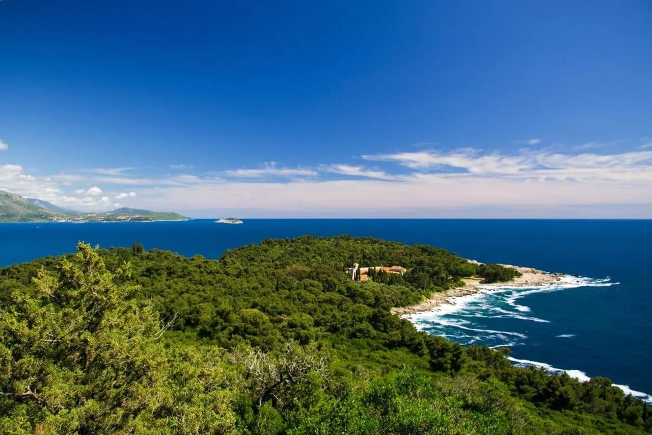 The wooded coastline of Lokrum island above the open sea