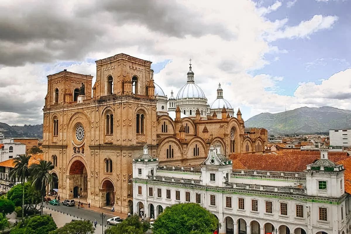 The brick towers and blue domes of the cathedral in Cuenca
