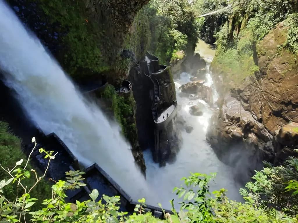 The Pailón del Diablo waterfall plunging into a green canyon near Baños