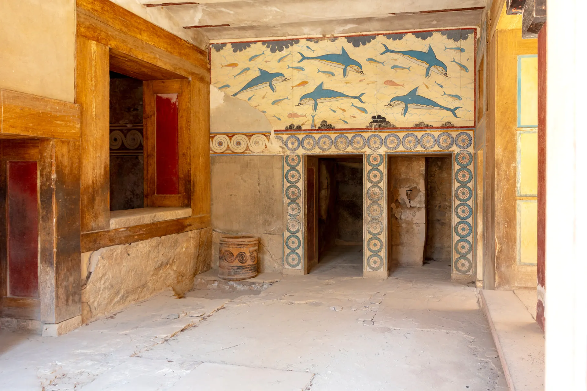 The dolphin fresco above a doorway inside the Palace of Knossos