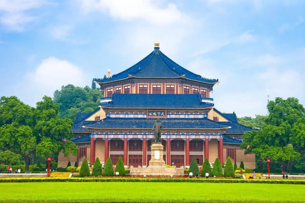 The blue-roofed Sun Yat-sen Memorial Hall behind green lawns