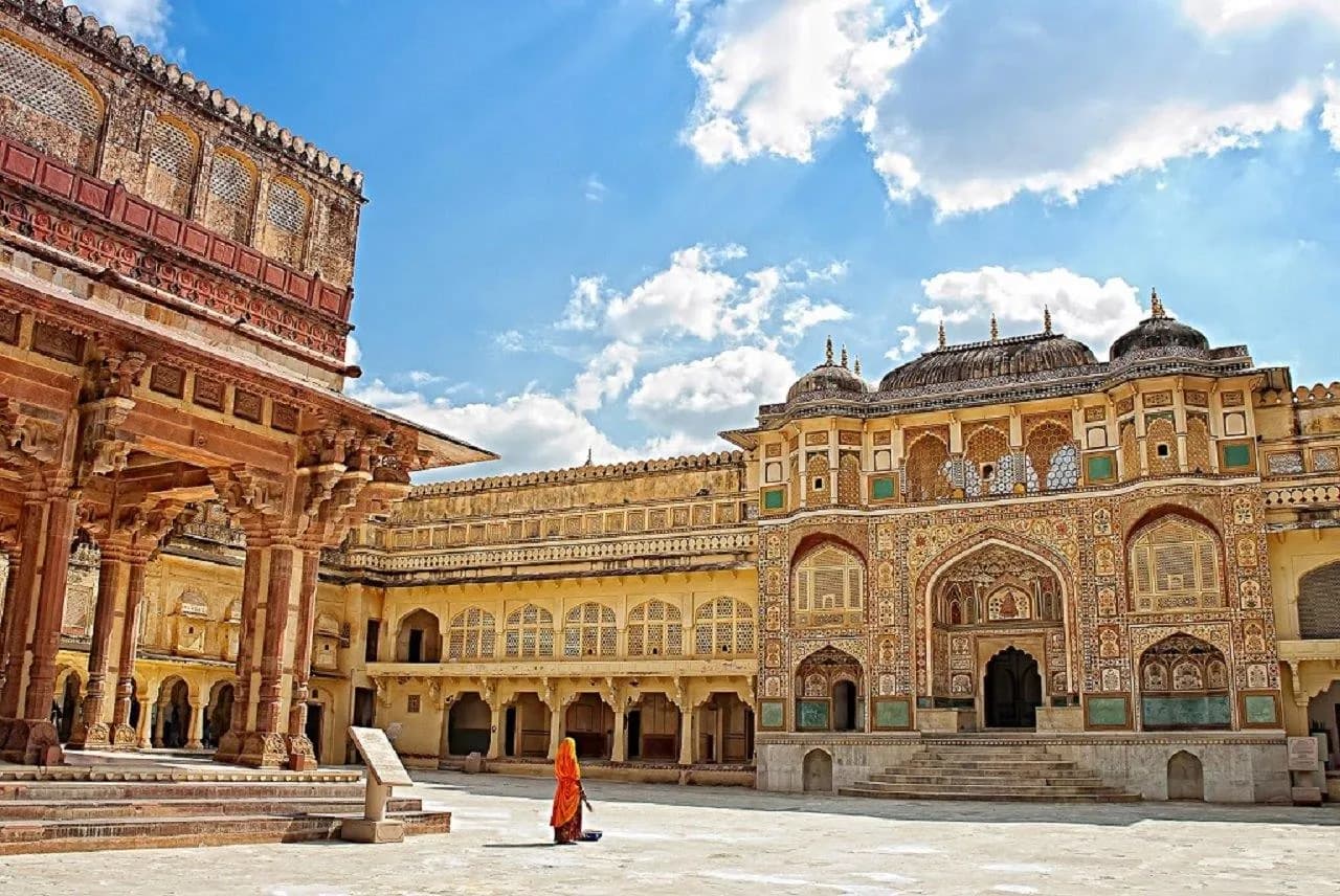 The painted gateway and courtyard inside the Amber Fort