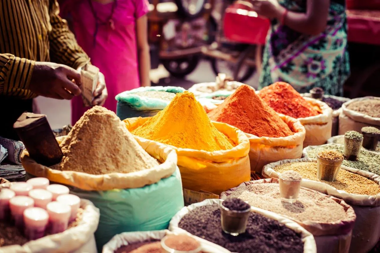 Sacks of coloured spices at an Indian market