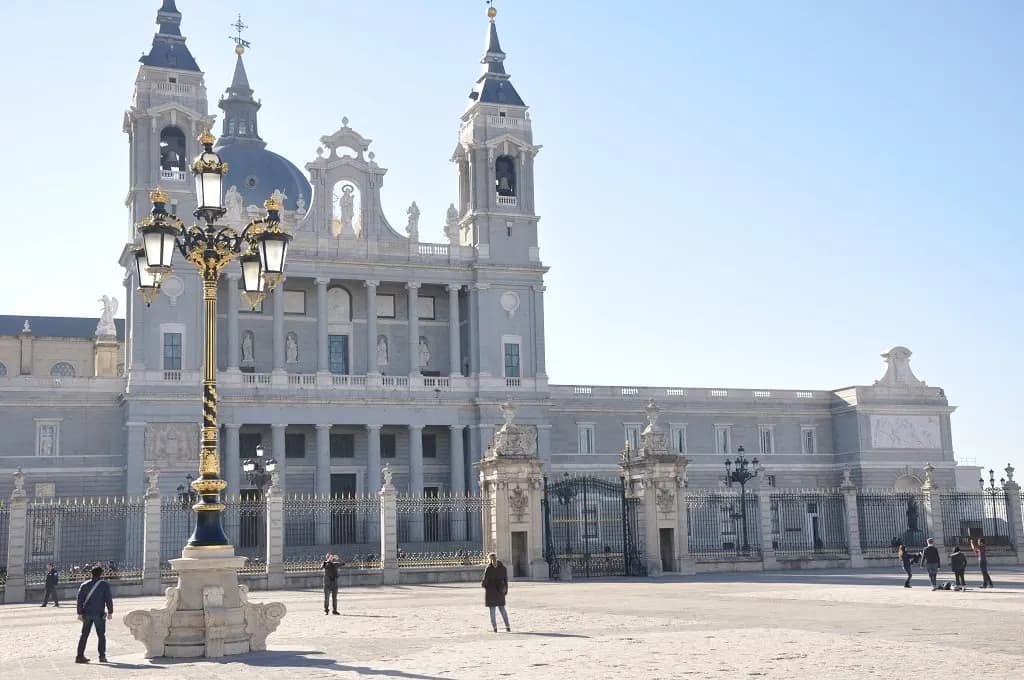 The pale stone façade and towers of Almudena Cathedral