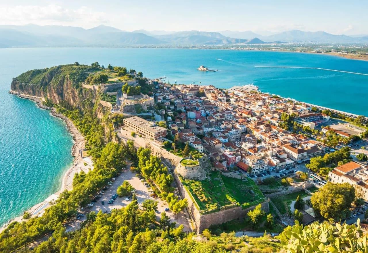 Nafplio's old town on its headland above a turquoise bay
